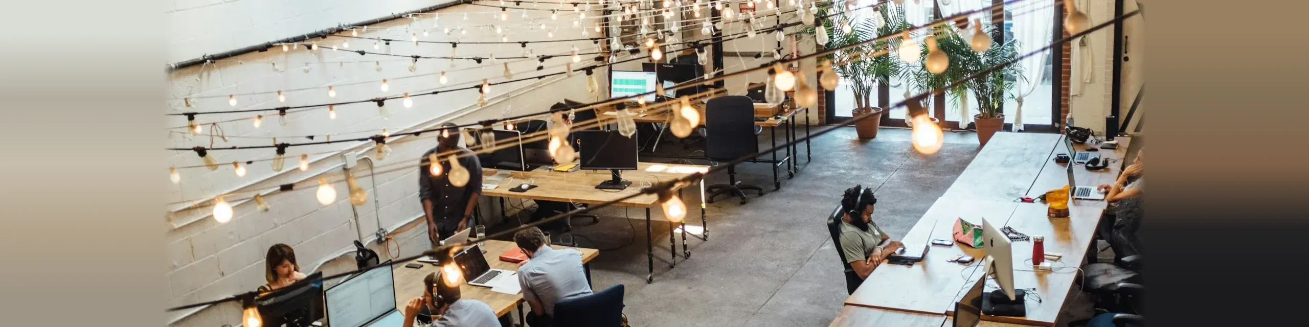 Dedicated development team working together in an open studio